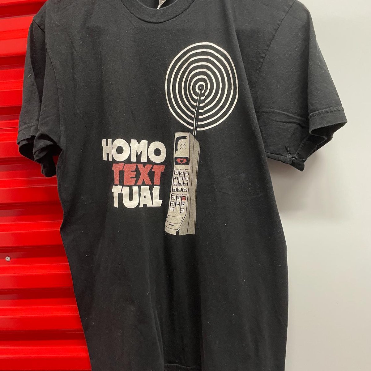 clndstnarchive's tweet photo. today's (very delayed, i gto busy), item is the homo textual shirt! i don't have a date on this one, i've seen it for sale once or twice but it's one of my faves bc of how ridiculous it is https://t.co/fuUoZNrKKq