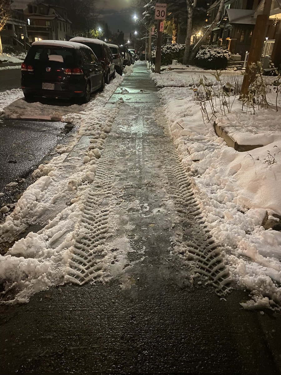 Breathnagh72's tweet photo. So my bike is parked and will be until the city can effectively clean- this is how well the sidewalk was done… the street was not… as for the bike lanes- concrete barriers pushed into them Lansdowne south of Dundas @311Toronto @NotSafe4BikesTO @TheBikingLawyer https://t.co/aYd6OuFyA4