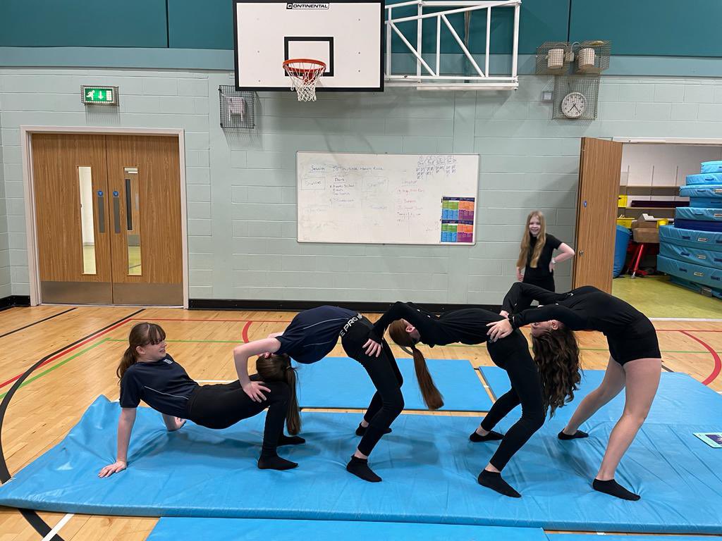 NDHSPE1's tweet image. Our wonderful S1.2 class showing off their gymnastics skills, focused on group balances 🤸‍♂️

Great work guys 👏🏻 #BalanceandControl #FocusandConcentration 
#Creativity  @ndhs1