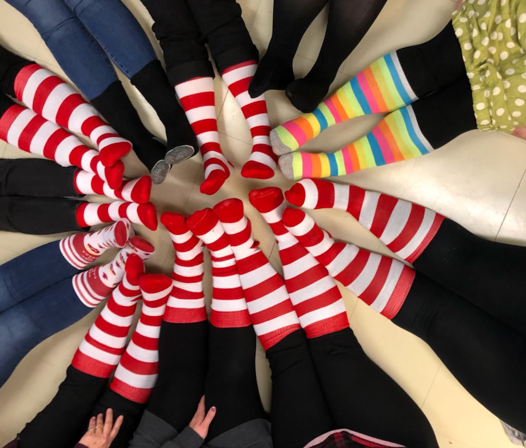 The staff at Holy Family touched toesies today for Sock It Day! 🧦 @RMHC <a href="/HFelementaryCA/">Holy Family Elementary - Chapel Arm</a>  😃