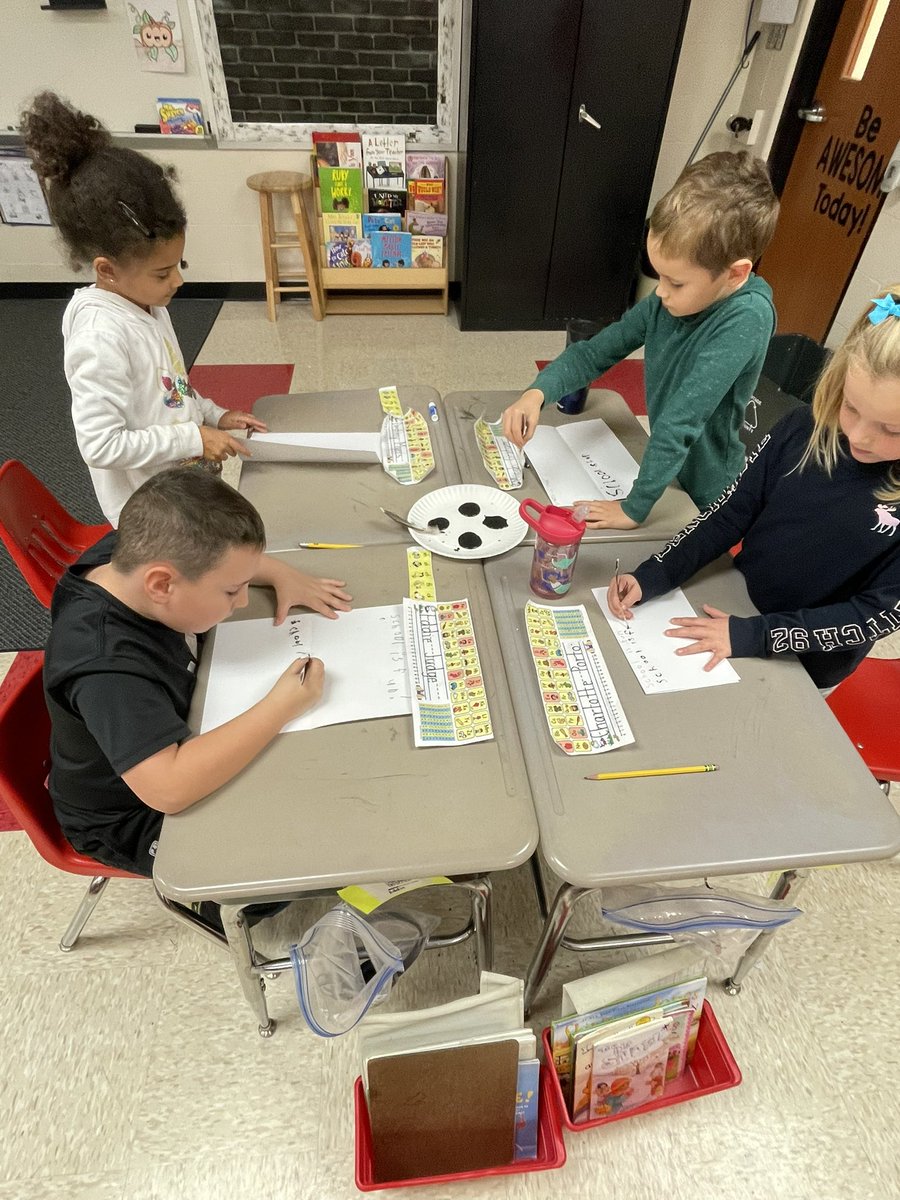 First graders were comparing long ago and today. They were practicing writing with a quill like long ago. #wearefield