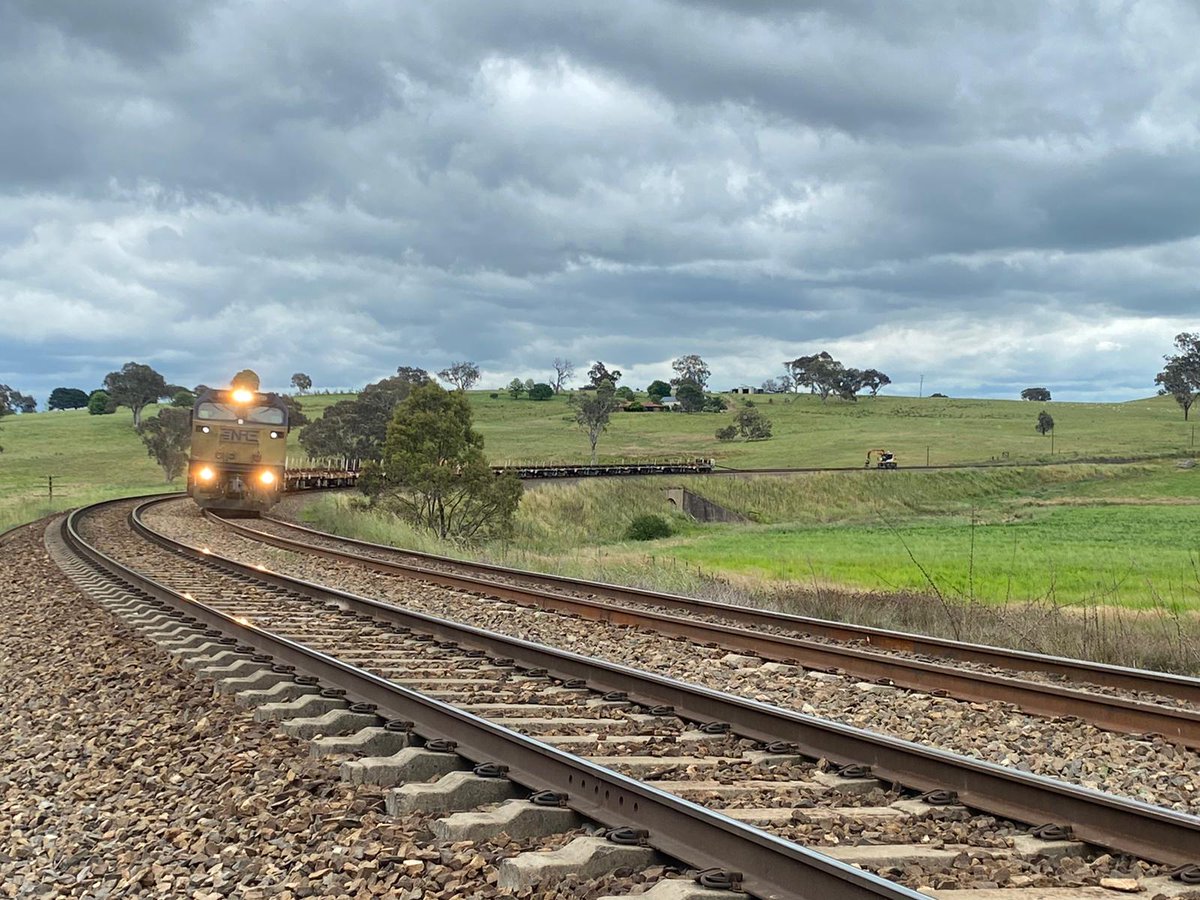 GroupThee's tweet photo. Rail train delivering rail across country NSW for the Re-Rail 🛤

🎶Johnny Cash 🎶- I hear the train a-comin’, it’s rolling ‘round the bend 

Who can name the song? https://t.co/9uGBZ6MRCB