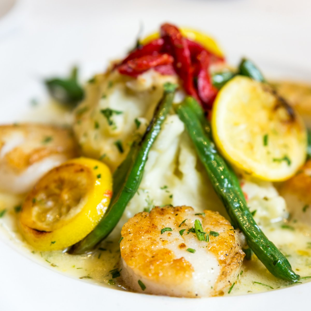 Save the sponge and put away your dishwasher detergent. We'll do the cooking tonight. How do lemon seared scallops sound?