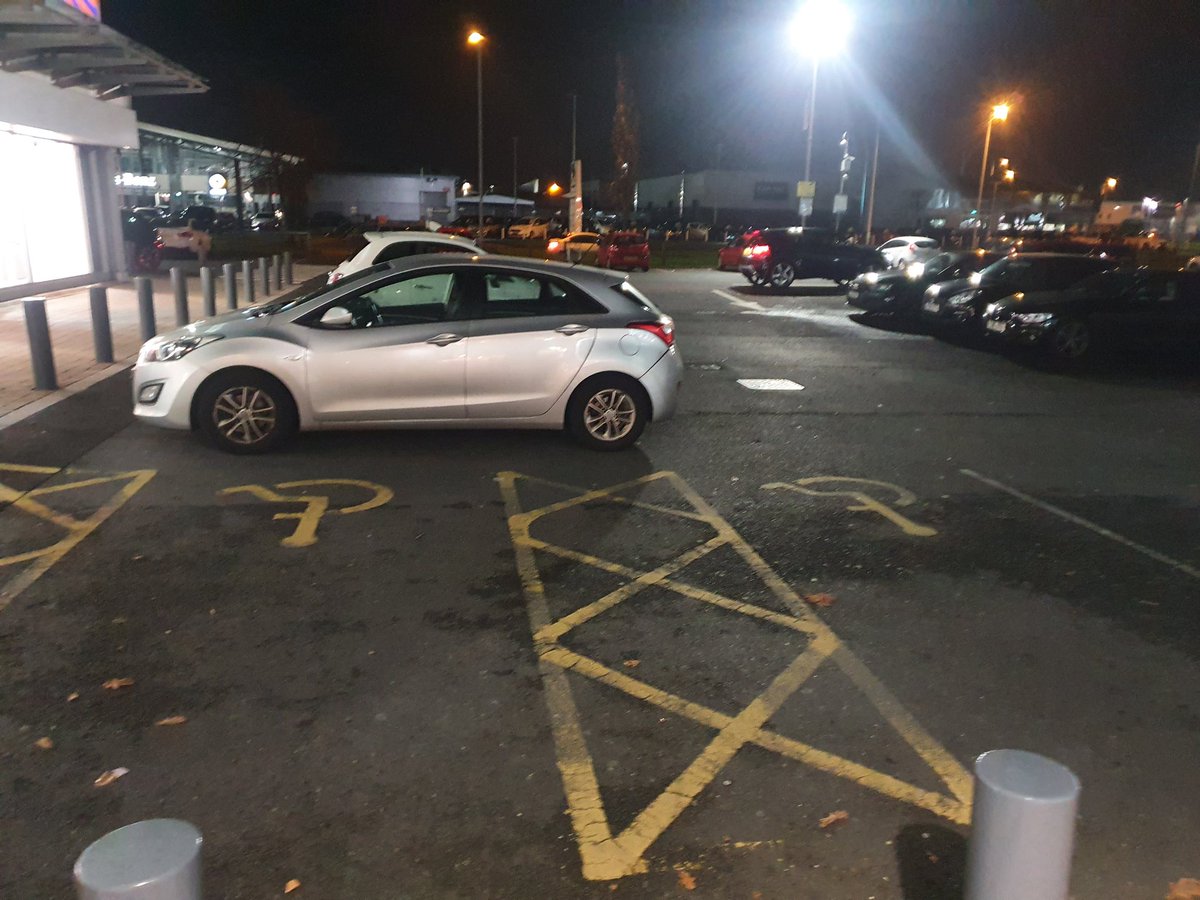 ColmOR_SL_BT's tweet photo. Parking over two disabled spaces at Boucher. Shameful selfish parking https://t.co/4WciaC9Ggz