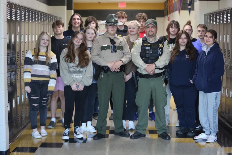 Trooper Nance stopped by C-DHS for a tour by our SRO Saul Mancha. While touring the building he visited a few classes. Mrs. Sampson’s class didn’t miss the opportunity to take a picture with him. They enjoyed meeting and speaking with him. #AmericanEducationWeek