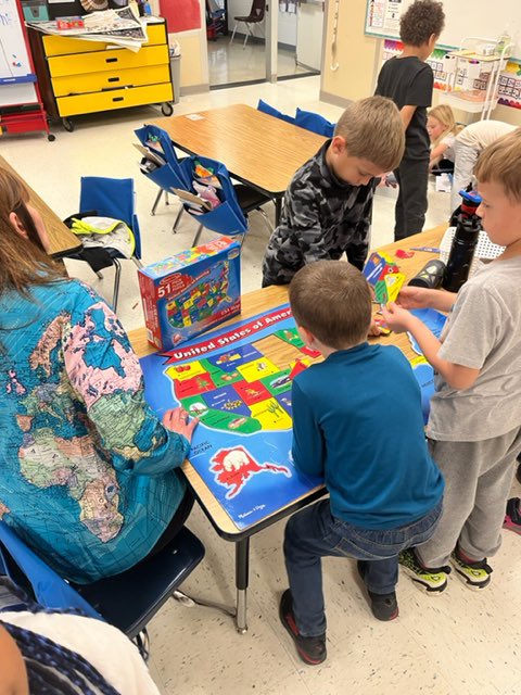 CalvertSS's tweet image. SS learning specialist, Nicole Penix had a wonderful day working with 1st graders at Calvert ES. Ms. Ewalt’s students loved working with maps!