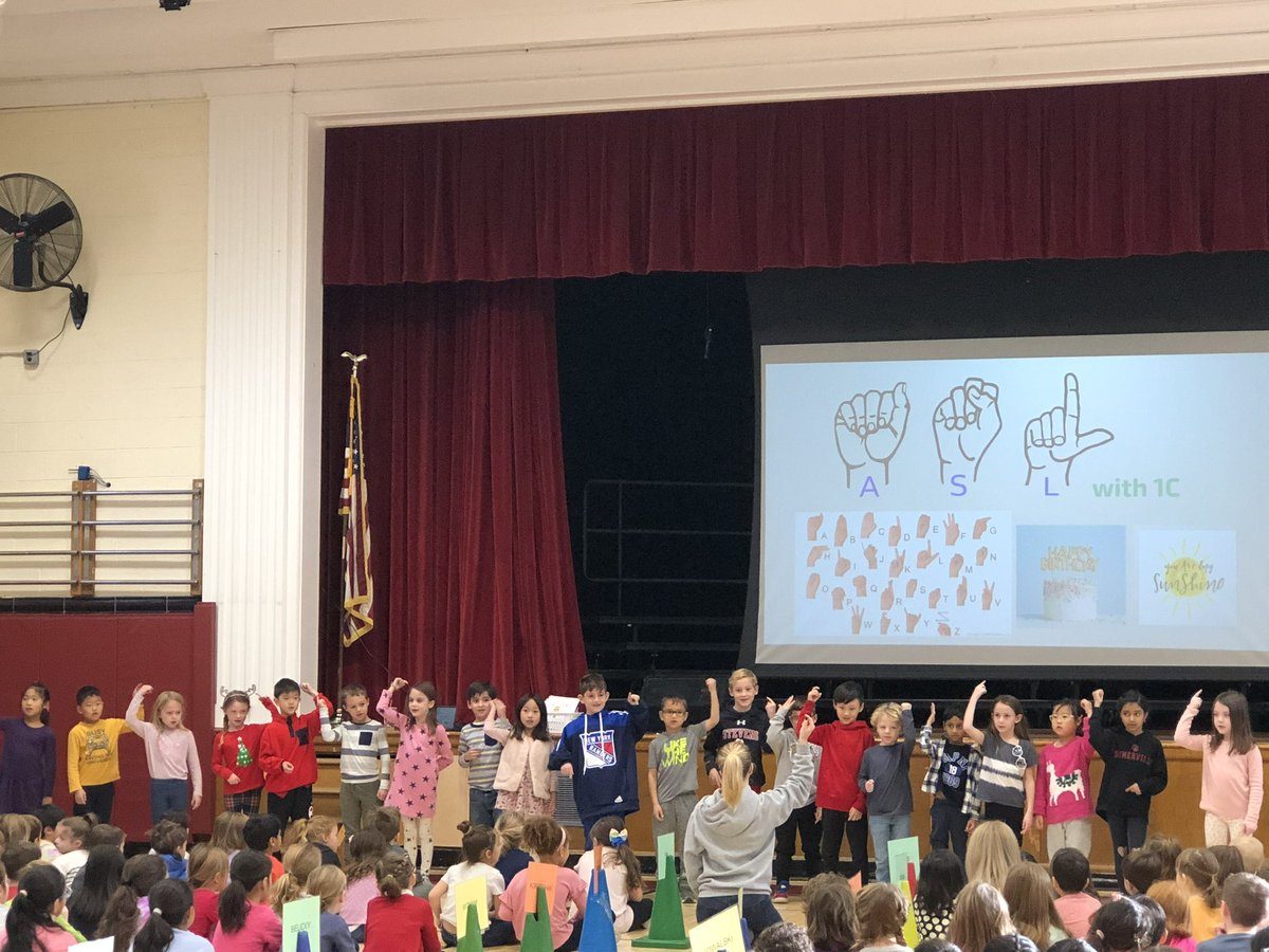 RPS_Somerville's tweet photo. What fun we had today in our Team Somerville Assembly.  We learned about how to keep our bodies calm, enjoyed songs sung in ASL, and had a sneak peek at the upcoming winter concert.  It is great to be on Pleasant Ave.  #TeamSomerville #Somerville https://t.co/bsgdoBxZlk