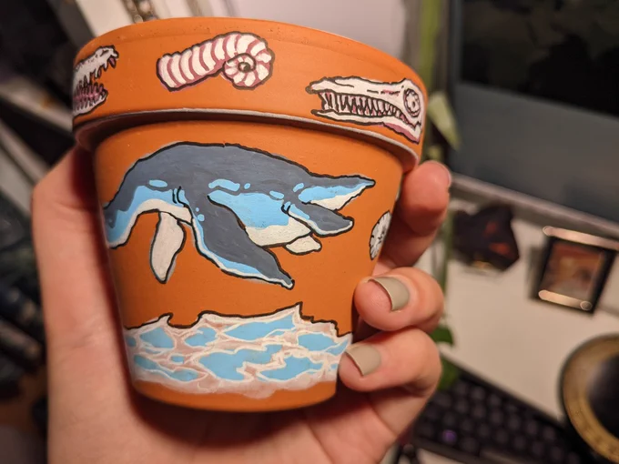 been painting on some cheap plant pots and boy is it fun 