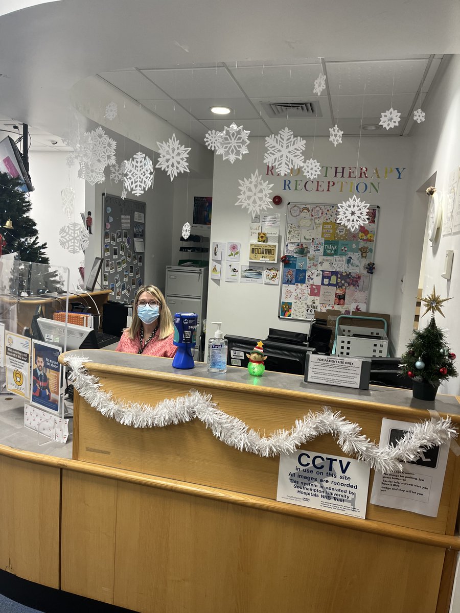 UHSradiotherapy's tweet photo. It's the most wonderful time of the year! @UHSFT Radiotherapy Reception is ready to greet patients with some Christmas Spirit! How could you not be jolly when you come in to see the decorations and Tash sat their with her lovely smile?!❤ #UHSFT #UHS #UHSRT #UHSXmas https://t.co/53KKHLEYj4