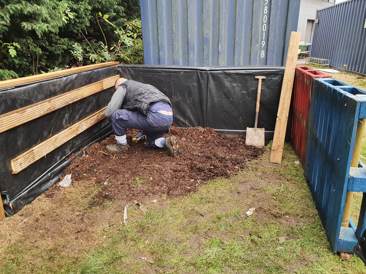 GreenCrew1's tweet photo. Green Crew putting the finishing touches to a composting bay at the Rugby Memories Garden @WiganWarriorsCF. https://t.co/3PBuOvcKqi
