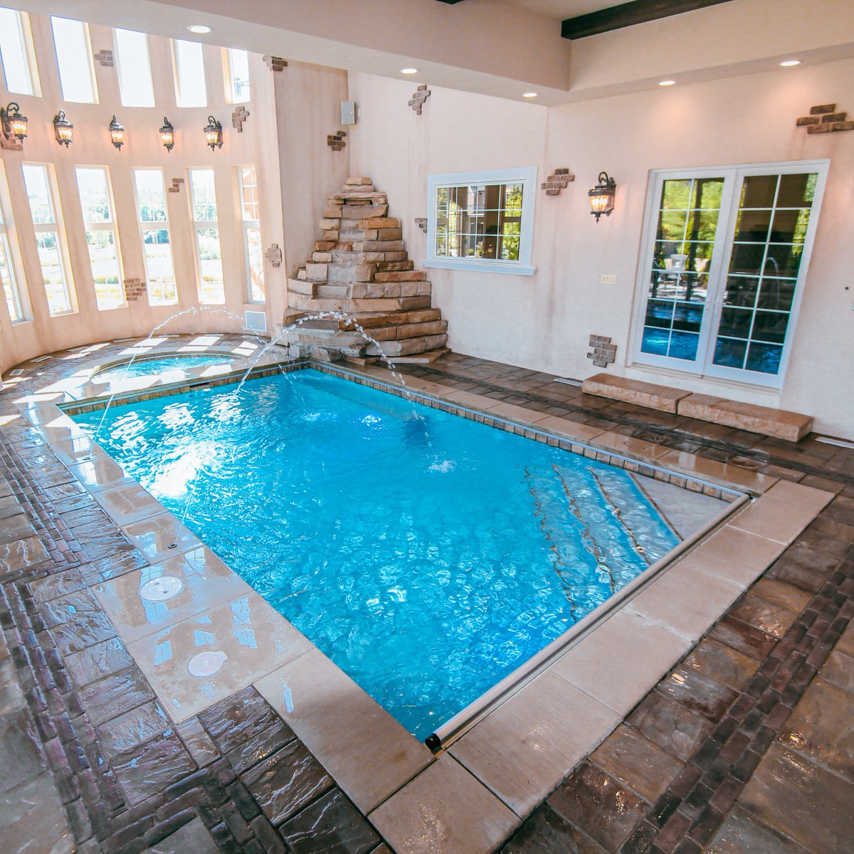 Rain or shine, enjoy a swim in any weather with a custom indoor pool.