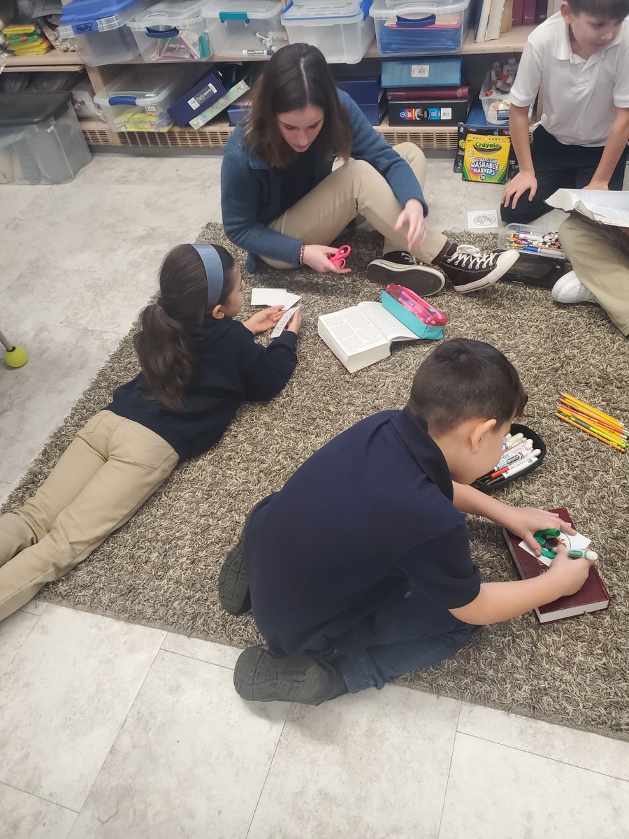 olaschool's tweet photo. "A shoot will sprout from the stump of Jesse, and from his roots a bud shall blossom." - Isaiah 11:1

Today, the 2nd and 8th graders read about Jesus's lineage. Then they made ornaments for their Jesse Tree, showing Bible stories about the royal history of the Prince of Peace. https://t.co/OXBBPWZVpc
