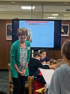 ABWestrick's tweet photo. I had the best time leading writing workshops in the Robious MS library this month. Students wrote scenes full of sensory details, each with a different point of view. It was all about loving the process of writing. A great day! @RMSlibrarylady @DonnaFWilson #oneCCPS #robioUS https://t.co/8jTNiKNMle