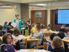 ABWestrick's tweet photo. I had the best time leading writing workshops in the Robious MS library this month. Students wrote scenes full of sensory details, each with a different point of view. It was all about loving the process of writing. A great day! @RMSlibrarylady @DonnaFWilson #oneCCPS #robioUS https://t.co/8jTNiKNMle