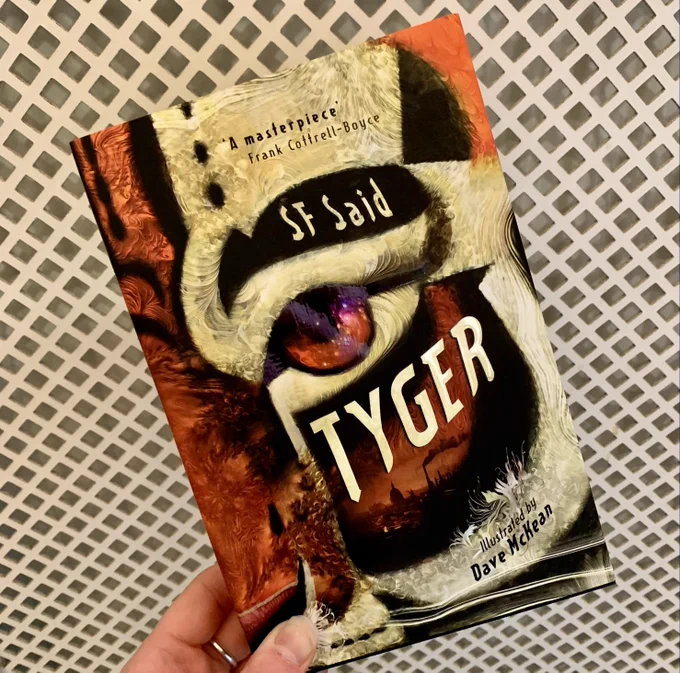A copy of Tyger held against a white background