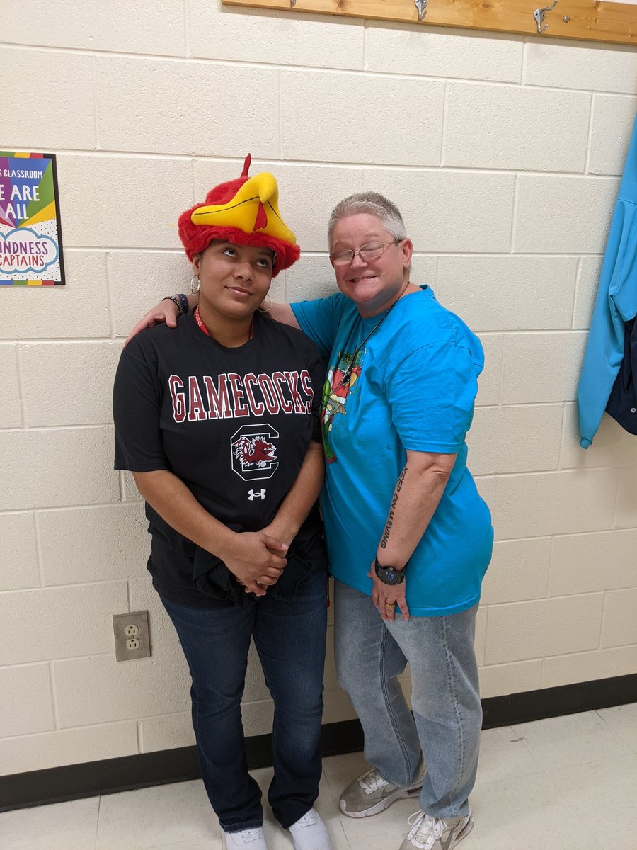 LarryDevilCat's tweet photo. This lady right here is a good sport! She gave up her tacky Tiger wear for some classy Carolina wear for the day! Keeping up her end of the deal! Go Gamecocks! https://t.co/OmrfXni00P