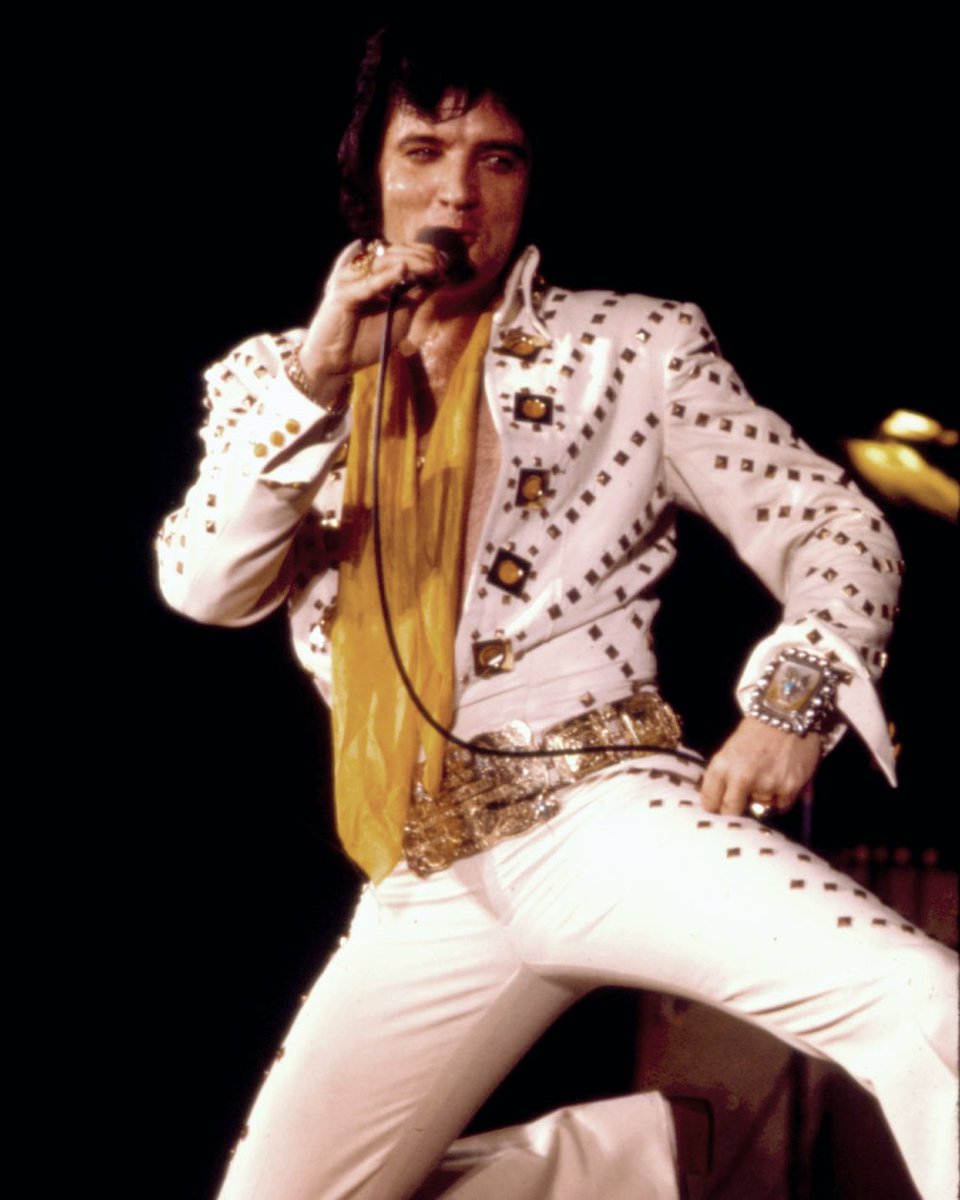 The “Adonis,” or “White Comet” jumpsuit made its debut during Elvis' first  Madison Square Garden concert on June 9, 1972. This jumpsuit had a matching  gold lined cape. #ElvisPresley #Jumpsuit #NewYork #NYC #, image size:960x1200