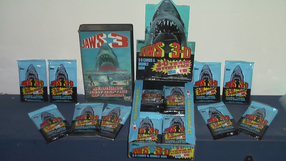 VhsMayor's tweet photo. Jaws 3 VHS Pre Cert Ex Rental first release with a box of collectable cards. #vhs #cardcollecing #jawsfilm #exrental #precert https://t.co/59DKNMxOFa