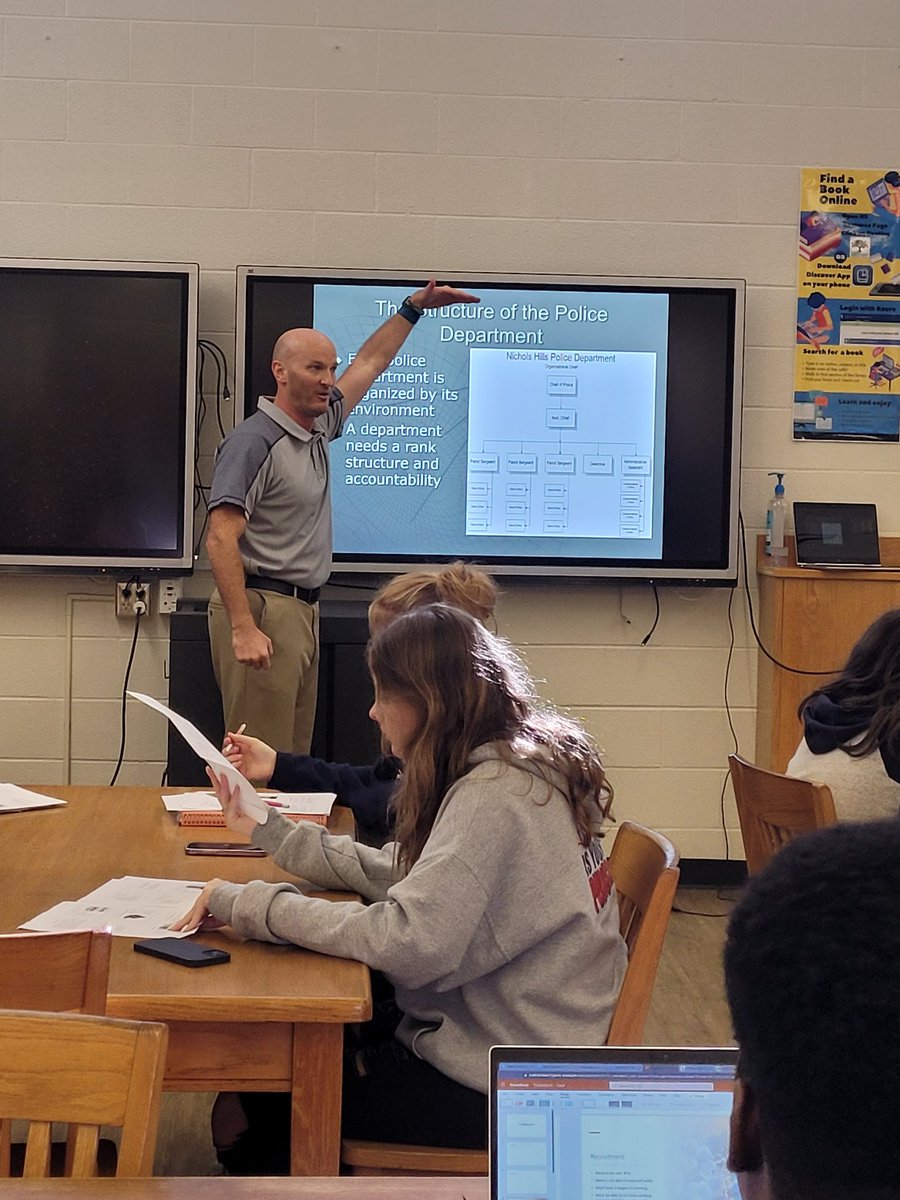 Keith Whitaker speaks to his experience on the police force to talk about different agencies and departmental responsibilities of Cherokee County in his Law &amp; Justice classes.