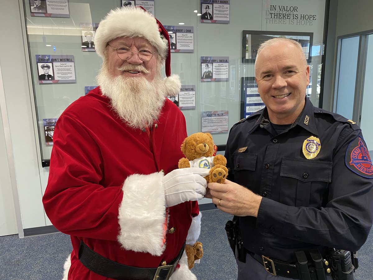 The big guy is about to get really busy so <a href="/NSPColonel/">Col. John A. Bolduc</a> was happy to help out with some Trooper Bears to give the kids! 

Merry Christmas, Santa, and have a safe and happy holiday season!