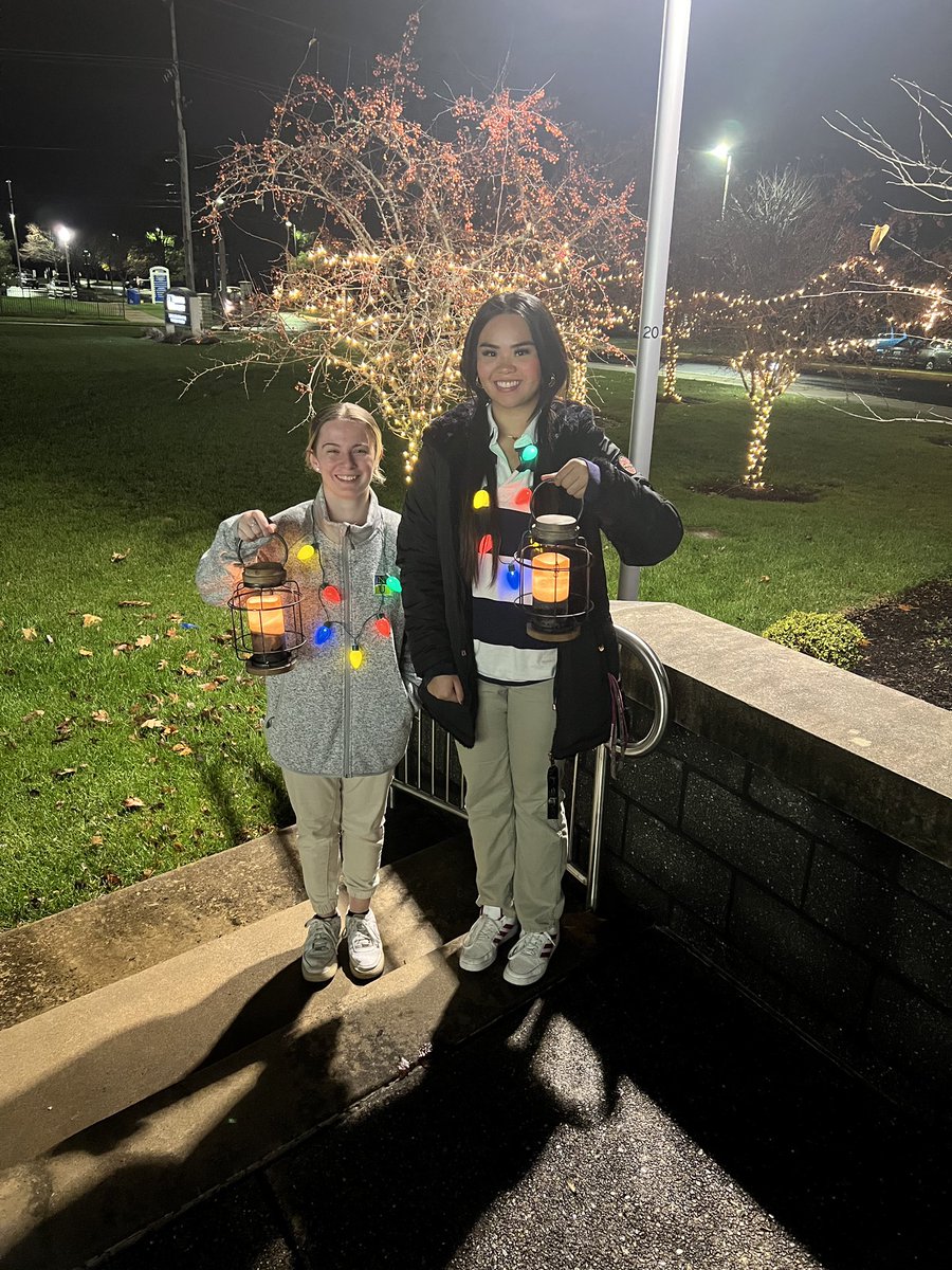 NeumannUniv's tweet photo. If you see campus glowing tonight that’s because our trees are lit and our Neumann Navigators are escorting newly admitted students during our holiday lantern tour 🤗 https://t.co/jFnUnCp0fz