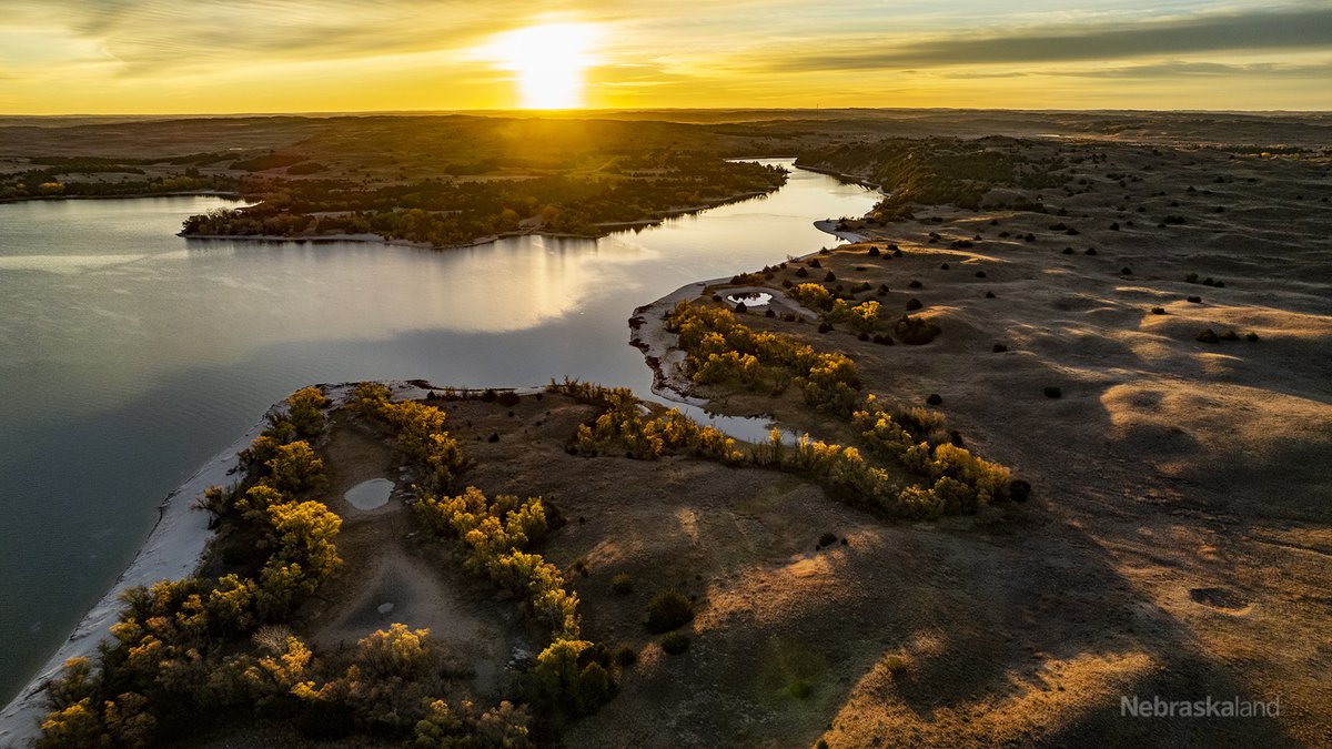 Sunrise at Merritt Reservoir, October '22. #nebraskaland #negameandparks #landscapes #publiclands #visitnebraska #naturephotography #fallcolors #sandhills