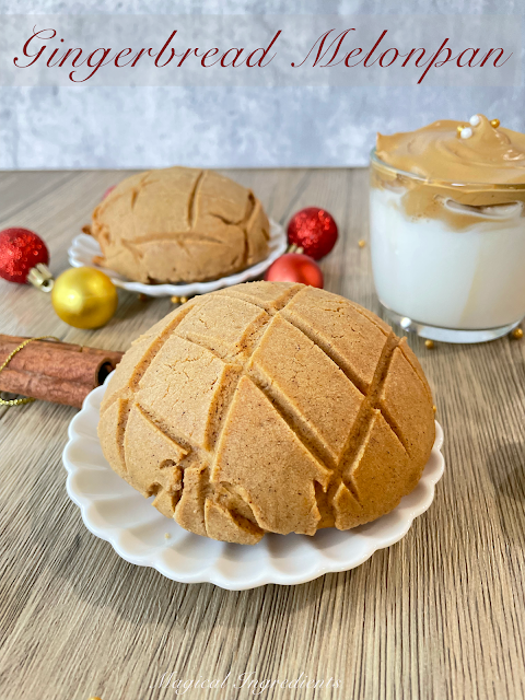 Gingerbread Melonpan - Delicious #buns with #gingerbread #flavors stuffed with #molasses cream and topped with a #gingerbread #cookie  #christmassweetsweek #holidayrecipe #breakfast #holidaybaking #eggless #warmspices  go.shr.lc/3EUNcoh