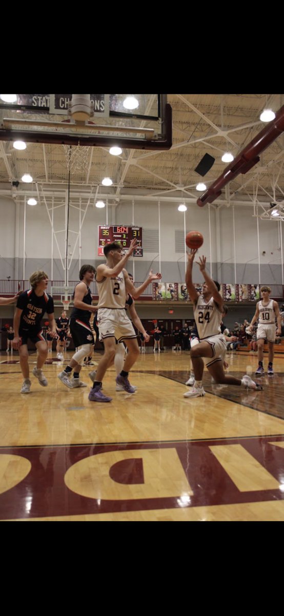 BCHSAthletics2's tweet photo. Tigers lost to Grayson Co. 62-72 last night…pictured are #3 Jackson Lee, #24 Wyatt Burnett (who made the shot) #2 Hunter Barr, & the awesome varsity Cheer squad…#LetsGoBC https://t.co/ApA901I0SS