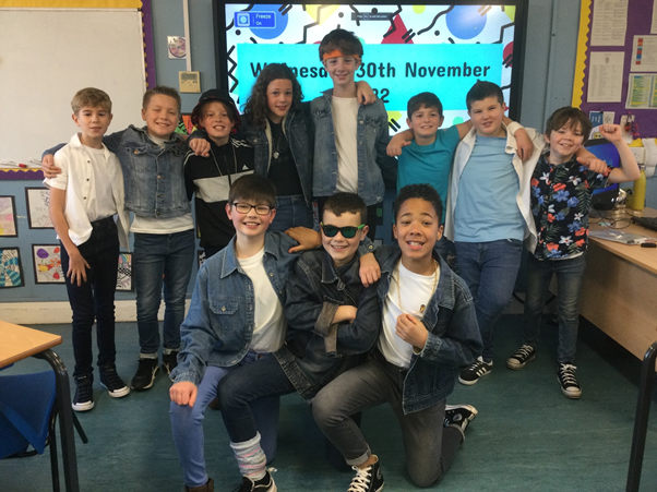EagleshamPS's tweet photo. P7.2 wanted to learn about the 1980s. Today they dressed in clothes inspired by the 80s and shared their learning with others at their class assembly.  Everyone loved their Thriller dance! #EPSCreativity https://t.co/G89kIjTF10