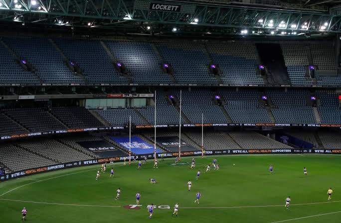 7_commentary's tweet photo. Yeah that's cool, but have you ever been to a North Melbourne Good Friday game? #electric https://t.co/9euNiypdFs