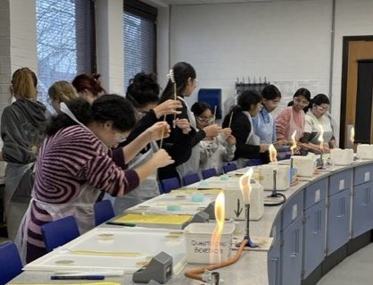 STAHSSixthForm's tweet photo. Year 13 Biology students carrying out a very cool practical to genetically modify bacteria 🧪 The petri dish shows genetically modified E.coli colonies glowing green under UV light. @STAHSBiology #STAHSSixth https://t.co/9AgnB3wx2W