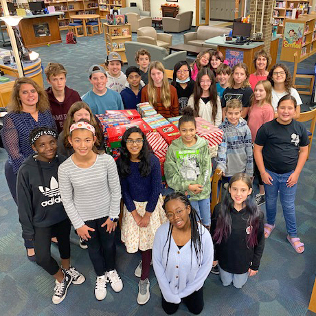 oneccps's tweet photo. The Robious Middle Builders Club collected toys, toiletries and school supplies and packed 41 Christmas boxes for children around the world. #oneCCPS #robioUS @DonnaFWilson @BuildersClub @Kiwanis https://t.co/I368T10mcL