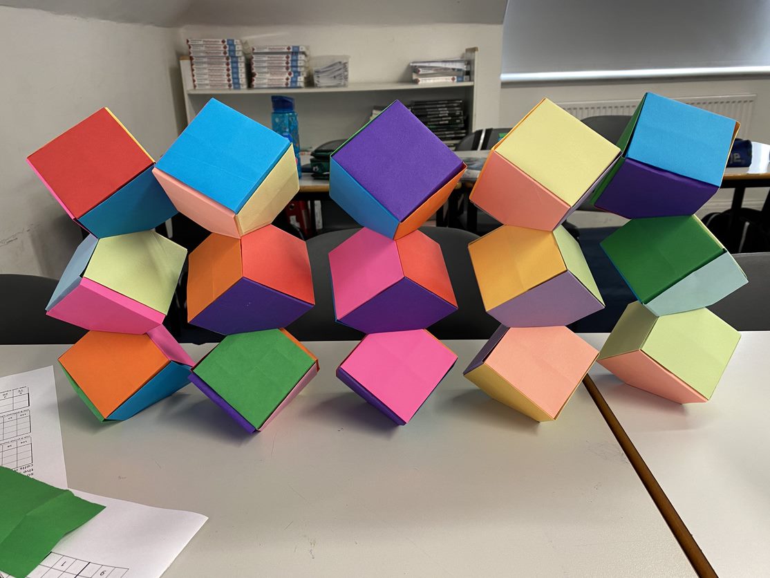 RadnorHouseTW's tweet image. Last week for Maths Week England, Y7 pupils made Columbus Cubes: carefully structured origami cubes that stack with no glue or tape. Lots of perseverance &amp;amp; teamwork showed, which we love to see at Radnor House 🙂

#beyondtheclassroom #MathsWeek2022
#creativity #radnorhousetw #TB