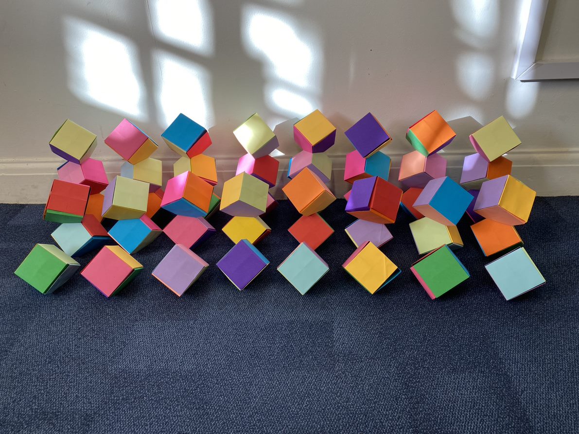 RadnorHouseTW's tweet image. Last week for Maths Week England, Y7 pupils made Columbus Cubes: carefully structured origami cubes that stack with no glue or tape. Lots of perseverance &amp;amp; teamwork showed, which we love to see at Radnor House 🙂

#beyondtheclassroom #MathsWeek2022
#creativity #radnorhousetw #TB