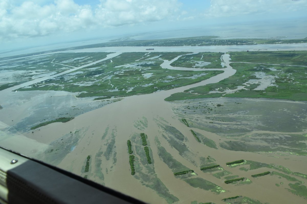 How do river deltas build land? Like this. As water from the muddy Mississippi River enters the coastal zone, the flow spreads, water speeds decrease and sediment settles out of the water column, creating a deltaic deposit.  #coastal #louisiana #delta