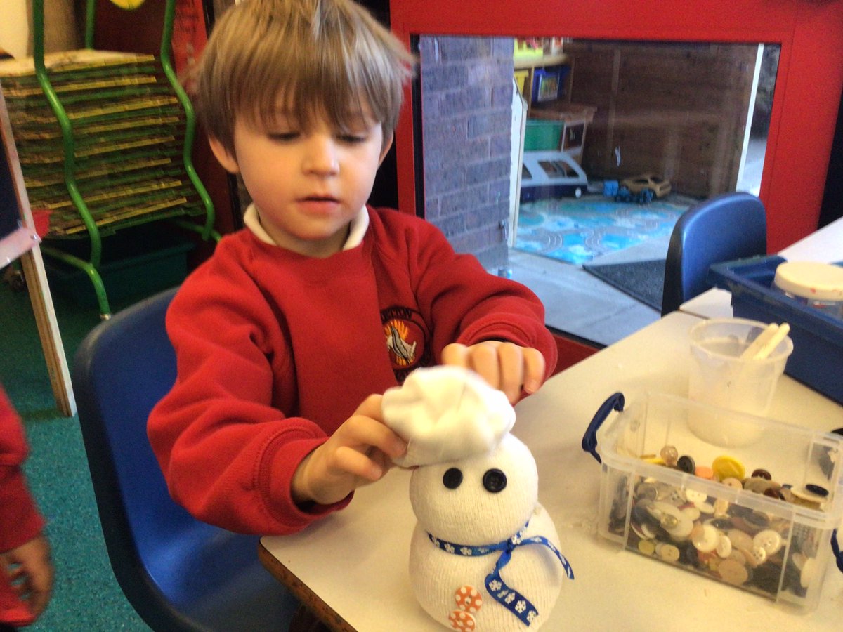 StrettonStMatts's tweet photo. Class R have made a snowman from a sock. We filled part of the sock with rice, tied it up and added eyes and buttons and a scarf. We then made the hat and put it on the snowman. #SSM #SSMReception #SSMExpressiveartanddesign https://t.co/58Q22XKk6W