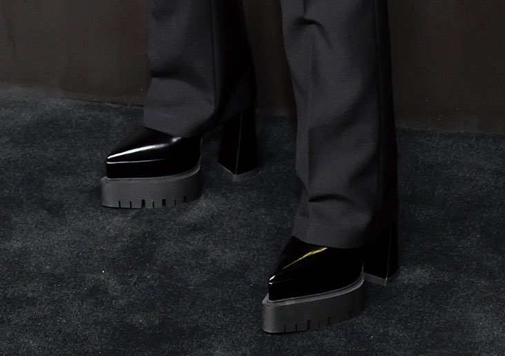 Willow Smith wears Stella McCartney Spring 2023 rtw with Versace platform Ankle Boots at the Apple Original Film’s “Emanciption” Los Angeles premiere.