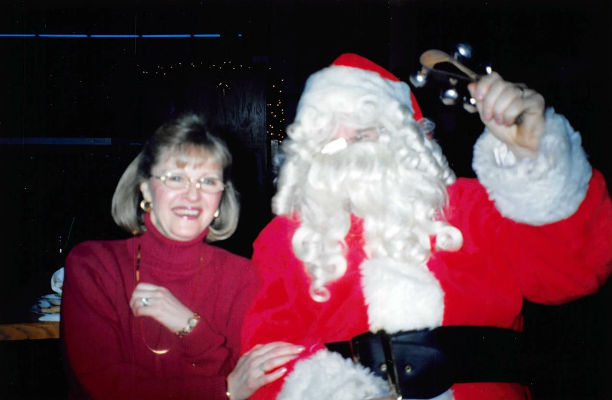 SJEnergy's tweet photo. This #ThursdayThrowback takes us to the 90s, when our longest serving employee Susan (who has over 50 years under her belt!) met Santa and he thanked her for such incredible service to Saint John Energy &amp; our community! #100YearsOfEnergy https://t.co/EtoVTKOCqY
