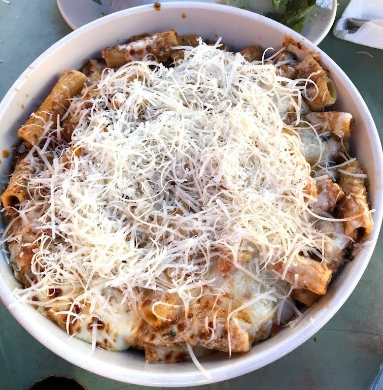 Would you like fresh shredded parmesan cheese on your pasta? Say when.