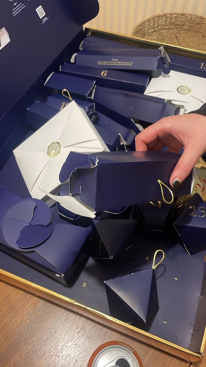 Vicky_Pipe's tweet photo. @Rituals I am absolutely disgusted how my £160 advent calendar has been packed and shipped to me. All the boxes are damaged beyond belief, the gold hooks aren’t even attached to hang off the tree!! This is utterly appalling that you would send customers something in this state!! https://t.co/udfDBduxEz
