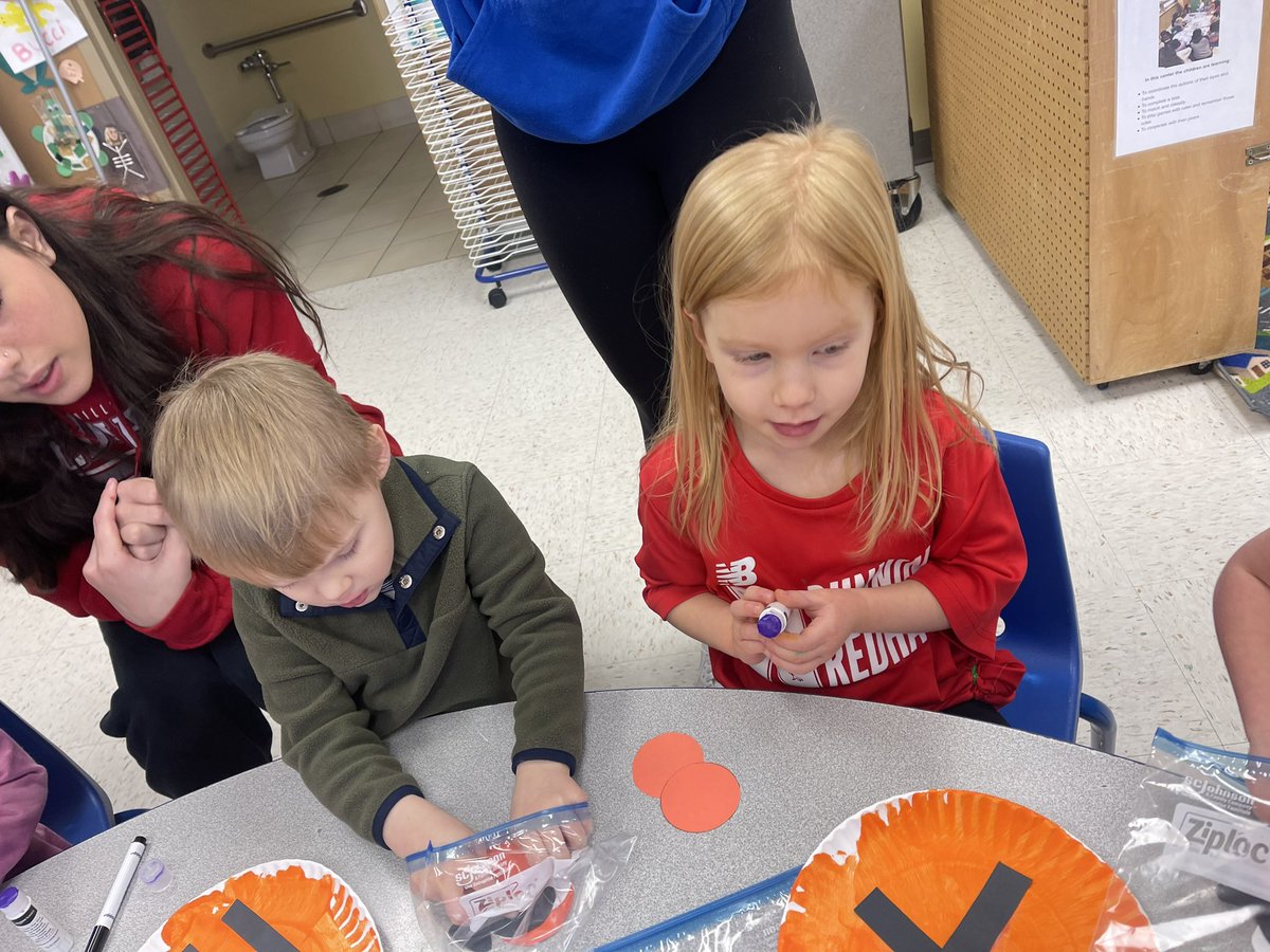 NCHSPreschool's tweet photo. Shapes with Mr Patrick while making a Tiger art project #jungleweek #partnersingrowth @NCHSOFFICIAL @NCHSRedhawksCTE https://t.co/u8uL3L2x7l