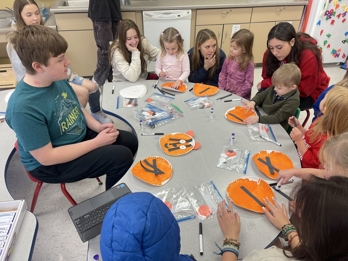 NCHSPreschool's tweet photo. Shapes with Mr Patrick while making a Tiger art project #jungleweek #partnersingrowth @NCHSOFFICIAL @NCHSRedhawksCTE https://t.co/u8uL3L2x7l