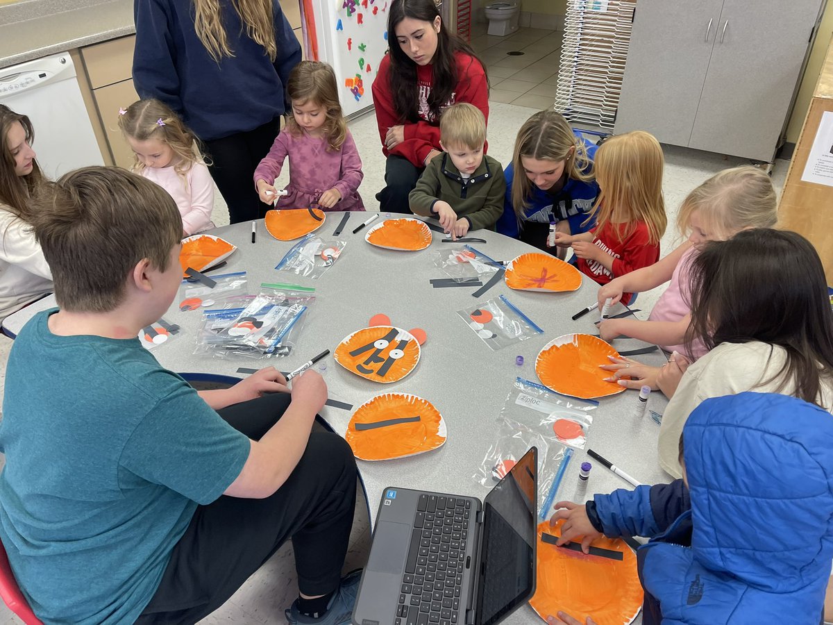 NCHSPreschool's tweet photo. Shapes with Mr Patrick while making a Tiger art project #jungleweek #partnersingrowth @NCHSOFFICIAL @NCHSRedhawksCTE https://t.co/u8uL3L2x7l