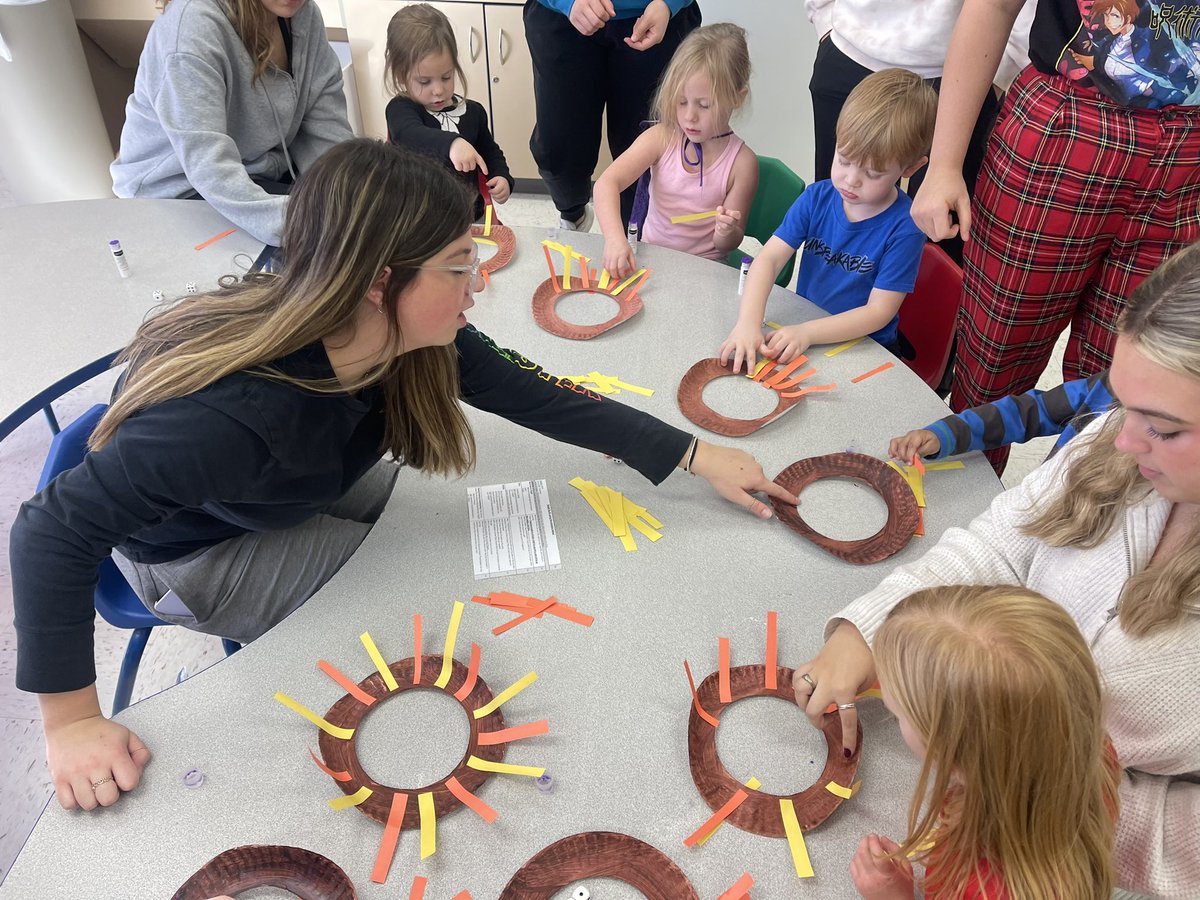 NCHSPreschool's tweet photo. Rolling dice and counting how many strips of paper to add to our lion mane art project with Ms Allison #partnersingrowth @NCHSOFFICIAL @NCHSRedhawksCTE #jungleweek https://t.co/iiRkLFGP4a