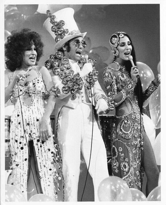 Happy 77th Birthday to Bette Midler! This is an epic photo of Bette, Elton and Cher!    