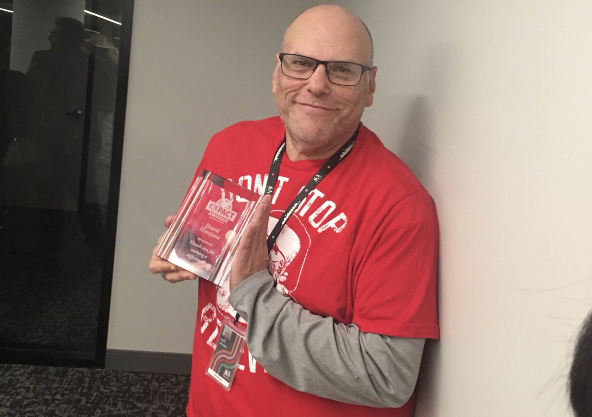 tom_orsborn's tweet photo. In a vote of his peers, our ⁦@hinojosa_david⁩ won a much-deserved ⁦@ExpressNews⁩ Impact Award that he received from publisher ⁦⁦@Medici1⁩ tonight at our Holiday Party. So happy for my hard-working, talented colleague and fellow Oblate Cafe patron. https://t.co/UsIdkea7UX