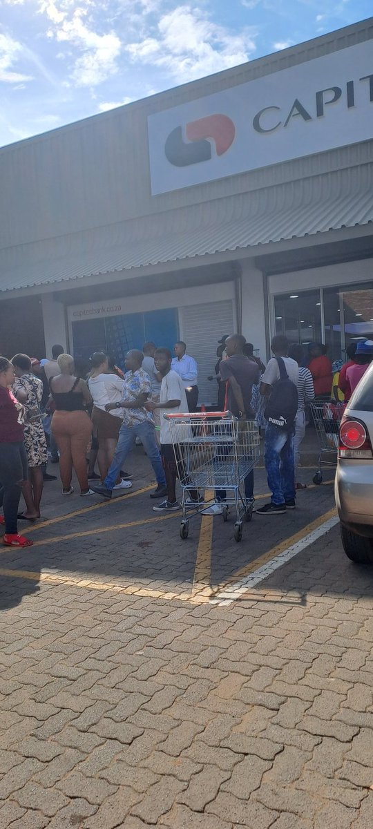 BrendaThulo's tweet photo. Capitec Branch in Palm Springs shopping center in Evaton closing ATMs because people complained about queuing in the Blazing sun, majority of the people here were pensioners as it was their social grants date. One guy with albinism wrote that he had to drive to another branch. https://t.co/ajXxq9q9f1