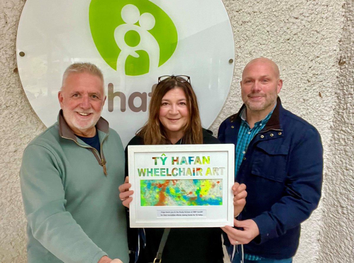 HMPCardiff's tweet photo. Following on from their incredible efforts in completing the 5 peaks challenge and raising £7140 for @tyhafan earlier in the year. Nigel,Pete and Mike were invited back to receive this stunning piece of wheelchair art which was produced for them by the children @tyhafan. Amazing! https://t.co/EiYTI0w2Rt