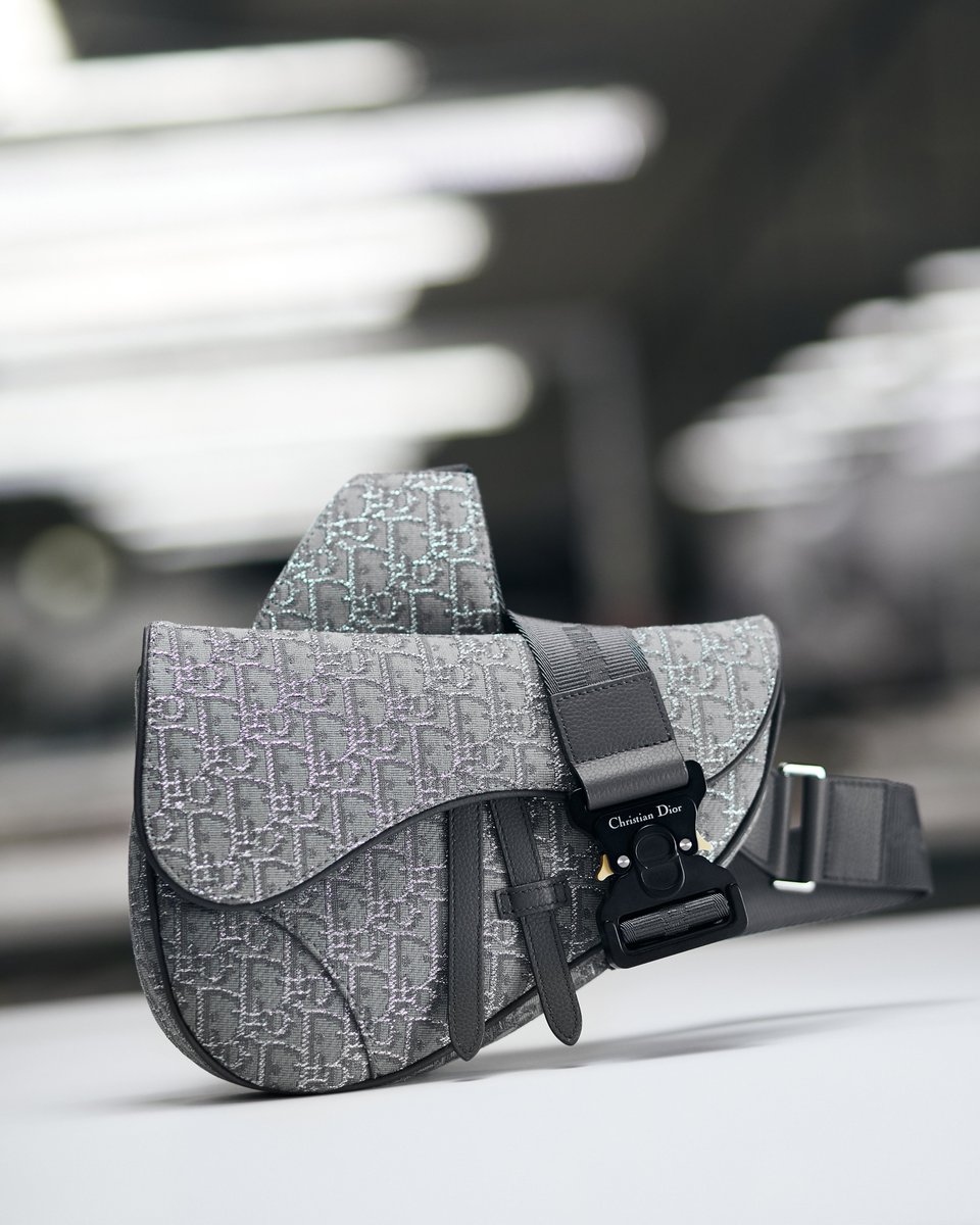 The emblematic #DiorSaddle is decorated with hints of Ruthenium-coloured lurex flourishes integrated into the #DiorOblique motif for a reinvigorated take on a classic for #DiorSpring23 by Kim Jones on.dior.com/menspring-23.