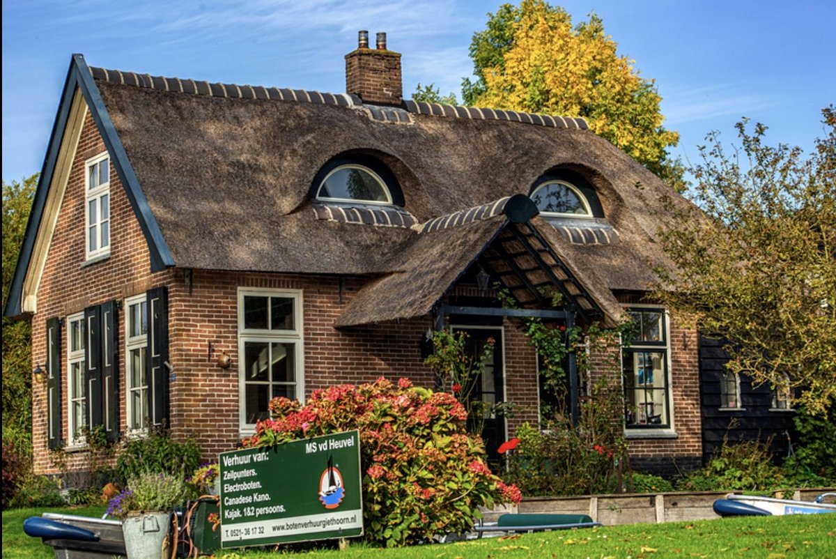 Giethoorn, 130 km North of Amsterdam us called the Netherland Venetia or the water village because it's canals and bridges. Giethoorn has very beautiful houses with typical straw roof, like this one I shoot early in the morning.A must visit place if you go to Netherland